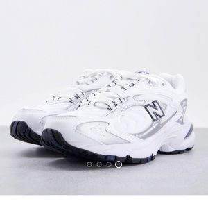 New Balance 725 premium sneakers in white and silver